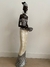 FIGURA EXCLUSIVA VANE | Africana parada con el cuerpo color negro con vestido nácar y vasija en internet