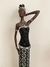 FIGURA EXCLUSIVA KANU | Africana parada con el cuerpo negro y vestido de canutillos y espejos. - comprar online