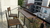 barra colgante plegable para balcón + 2 banquetas altas con respaldo en hierro y madera en internet