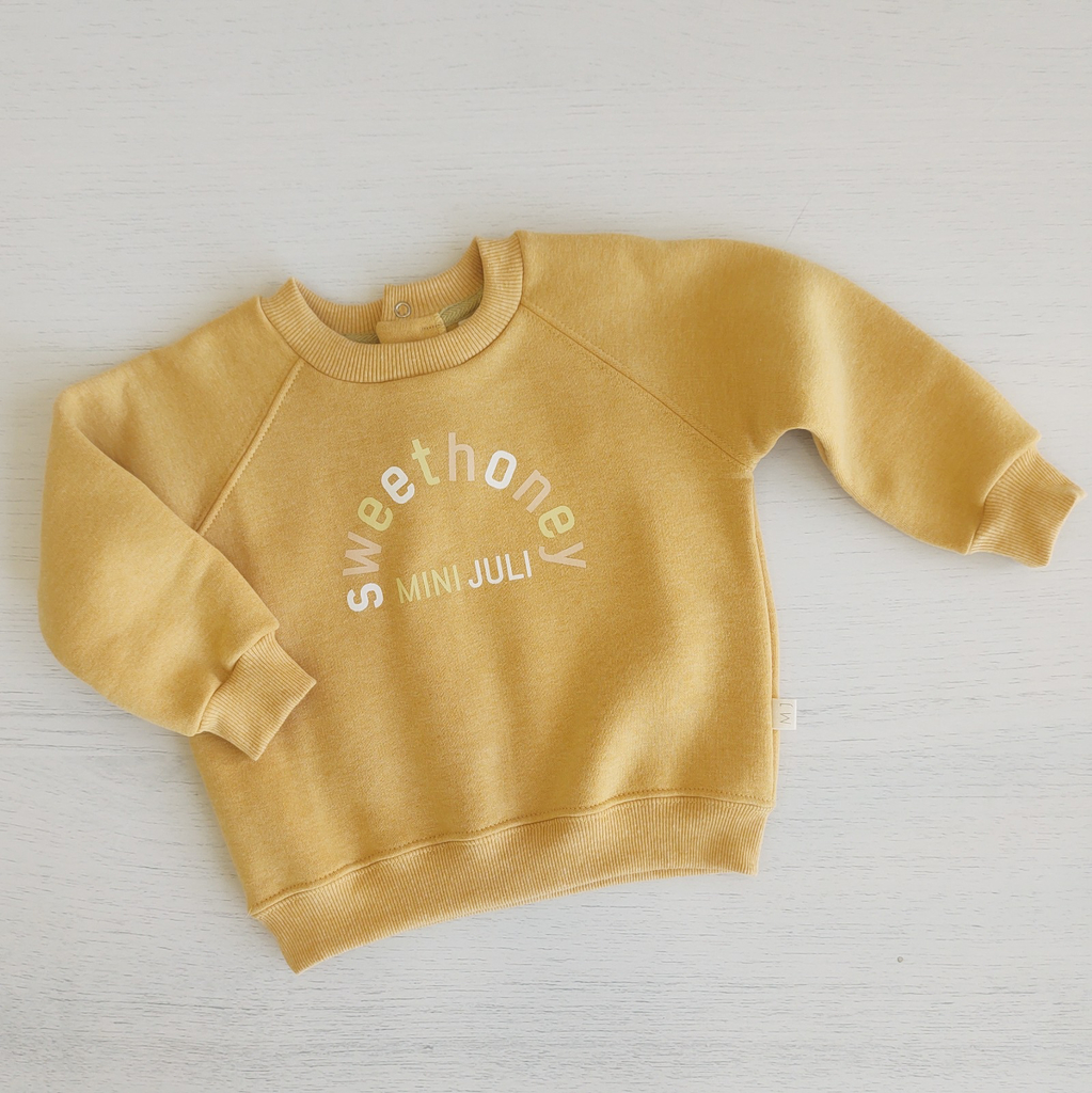 Buzo tommy amarillo new arrivals