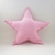 Almohadón estrella rosa