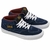 Tênis Vans Skate Half Cab nas cores navy e burgundy, com detalhes em camurça e cadarços brancos.