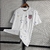 Image of CAMISA SELEÇÃO ESTADOS UNIDOS WHITE 23/24 TORCEDOR-NIKE- MASCULINA -BRANCA