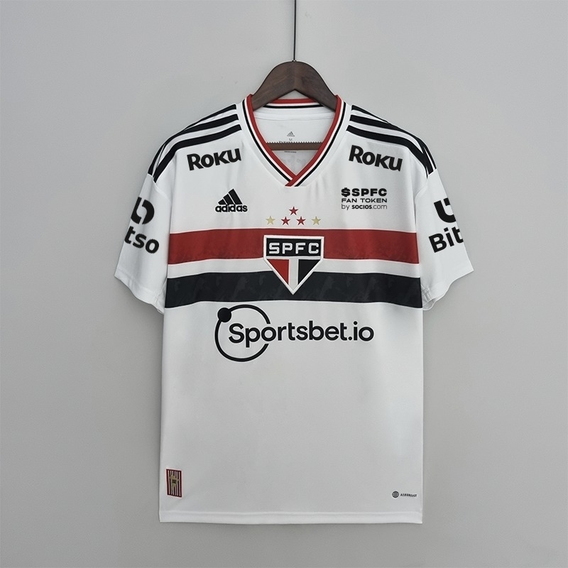 CAMISA SAO PAULO I COM PATROCINIO 9 CALLERI 22 23 TORCEDOR ADIDAS MASCULINA BRANCA COM DETALHE PRETO VERMELHO