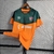 CAMISA TREINO FLUMINENSE 23/24 TORCEDOR-UMBRO-MASCULINA -LARANJA/VERDE