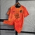 CAMISA ATLETICO DE MADRID TRAINING SERVER 22/23 TORCEDOR NIKE MASCULINA - VERMELHO/LARANJA