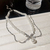 Collar Doble perlado con moño - Acero de Titanio en internet
