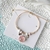 Pulsera con flor encapsulada - Merlina Tiendita