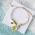 Pulsera con flor encapsulada - tienda online