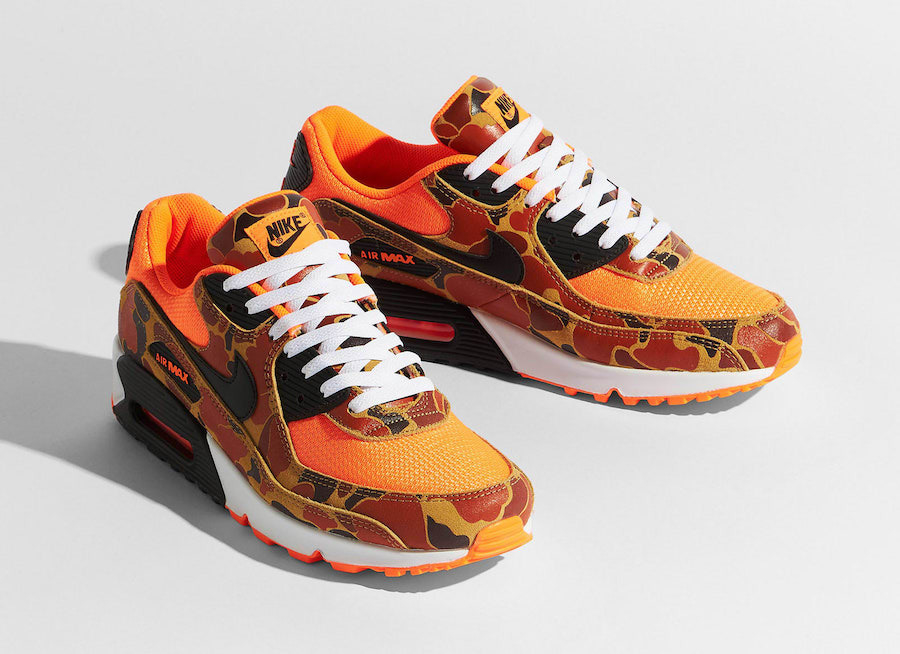 Nike orange best sale camo shoes