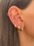 Piercing Conch Cravejado Dourado na internet