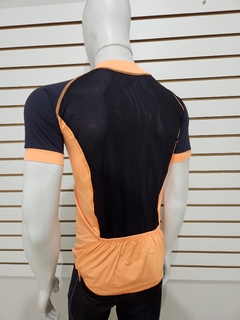 camisa de ciclismo - Branca, laranja com detalhe preto - comprar online
