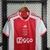 camisa-ajax-amsterdam-xxx-home-i-titular-2023-2024-23-24-masculina-modelo-fan-torcedor-branca-vermelha-bergwijn-3