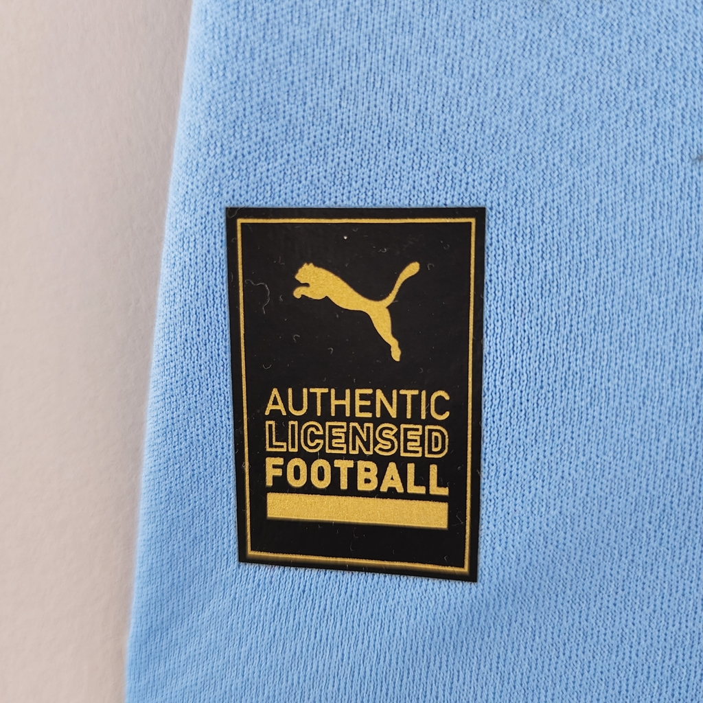 Camisa Pré-jogo Manchester City F.C. Masculina Azul - Camarote do Torcedor