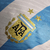 camisa-seleção-argentina-copa-do-mundo-2022-home-uniforme-titular-branca-qatar-branca-masculina-modelo-player-jogador-lionel-messi-de-paul-di-maria-julian-alvarez-dybala-enzo-fernandez-4