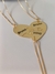 Cordão quebra cabeça formato de coração banhado a ouro 18K na internet