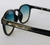 Óculos de sol unissex preto com lente esverdeada - comprar online
