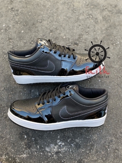 Nike preto baixo sales