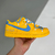 Tênis Futura x Nike Dunk Low SB Yellow