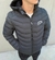 Campera Nike inflable importada gris