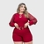 Macaquinho Feminino Plus Size Detalhes Com Tule e Cinto