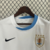 camisa-camiseta-uniforme-da-selecao-uruguai-uruguaia-2-ii-away-fora-visitante-branca-branco-white-nike-luis-suarez-copa-america-gola-azul-e-branca-24-25-2024-2025