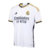 camisa-camiseta-uniforme-do-real-madrid-i-1-home-casa-titular-23-24-2023-2024-branca-branco-white-adidas-emirates-fan-torcedor-masculino-masculina-champions