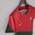 camisa-selecao-de-portugal-home-22-23-torcedor-nike-feminina-vermelho-e-verde-copa-do-mundo-para-mulheres-cr7-qatar