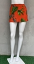 Short / Saia laranja floral - TAM P na internet