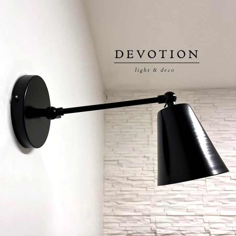 Aplique de pared negro "Modelo Petit" multiples movimientos verticales en 2 sectores.