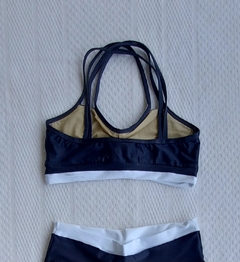 CONJUNTO SHORT CANELADO DE COMPRESSÃO BICOLOR na internet