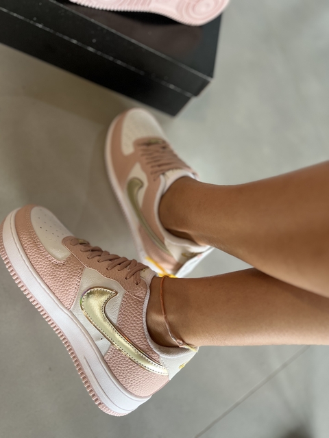 Pink and gold air force ones 2025