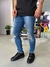 Calça Jeans Médio Rasgo no Joelho e Bolso Tin127847 na internet