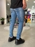 Calça Jeans Médio Rasgada Skinny com Puído na Barra Tin127684 - Reistilo Loja de Roupas e Acessórios Masculino e Feminino