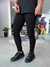 Calça Jeans Preta Rasgo no Joelho Masculina na internet