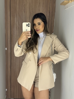 Blazer Balmain bege na internet