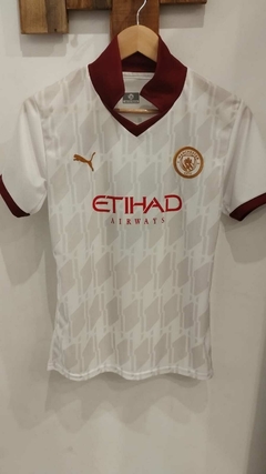 Camiseta Manchester City blanca cuello marrón niño