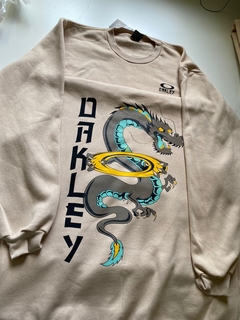 Camiseta oakley masculina the dragon tattoo tee branco