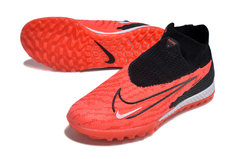 Chuteira Society - Nike Phantom GX de Cano Alto cor Fluorescente - Preto e Vermelho