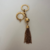 Chaveiro Louis Vuitton Tassel Dourado - comprar online