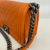 Bolsa Chanel Boy Média Laranja - loja online