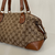 Bolsa Gucci Brick Lane Canvas Monograma Caramelo na internet