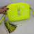 Bolsa Yves Saint Laurent Camera Lou Bag Matelassê Monograma Neon na internet