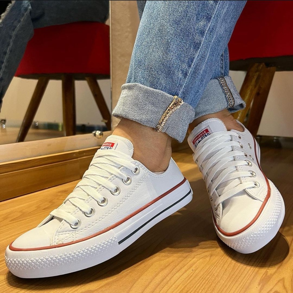 Tenis branco com vermelho sale