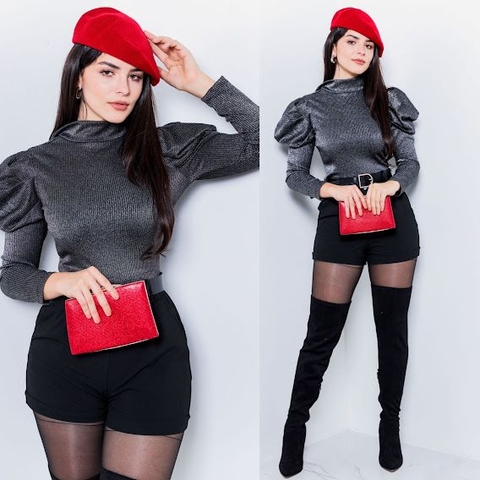 Blusa brillosa negra sale