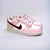 Descubra o estilo e conforto do Nike Dunk Low GS Pink Foam. Com uma combinação de cores rosa, branco e vermelho, esse tênis unissex é perfeito para qualquer ocasião. Feito de couro legítimo de alta qualidade, oferece durabilidade e estilo. Seu ajuste por 