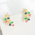 Brinco Ear Cuff Angela com Pedras Coloridas e Zircônias Folheado a Ouro 18k - comprar online