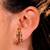 Brinco Ear Hook Sofia com Design Minimalista Cravejado de Zircônias - comprar online