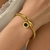 Bracelete Medalha Números Romanos Aço Inox Banhado em Ouro 18k na internet
