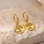 Argola Clic Medalha Árvore Da Vida Aço Inox Banhado Em Ouro - comprar online